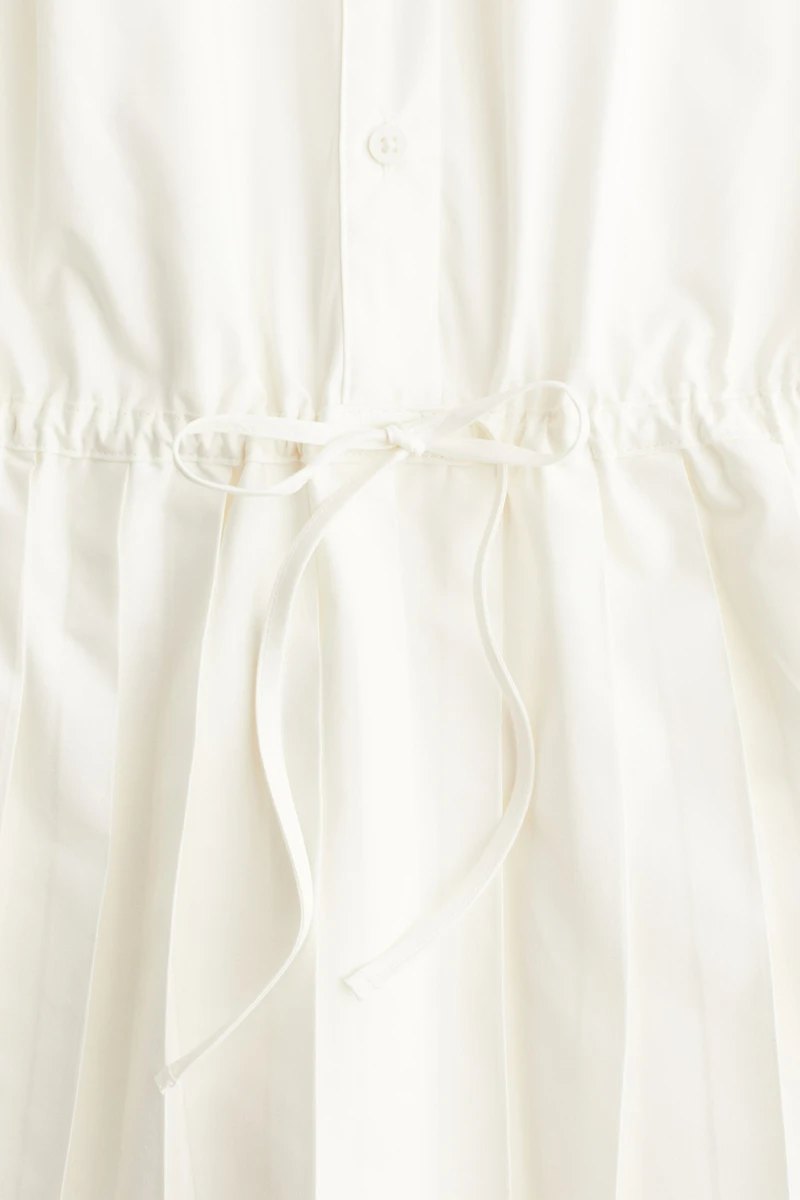 Shoulder-pad Dress with Pleated Skirt