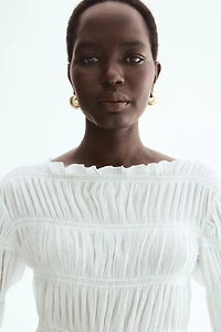 Haut nid d'abeille à encolure bateau