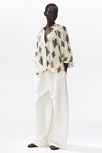 Blouse grande taille à manches ballon