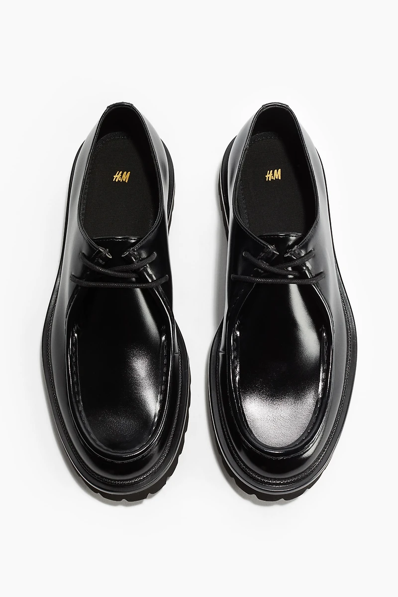 Chaussures rondelettes