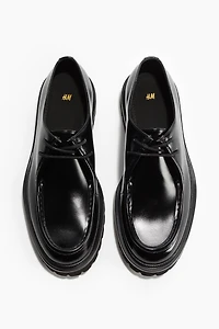 Chaussures rondelettes