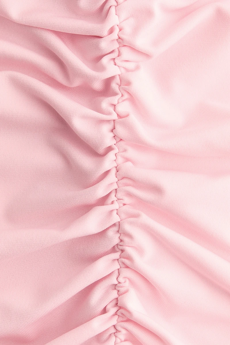 Robe asymétrique à effet drapé
