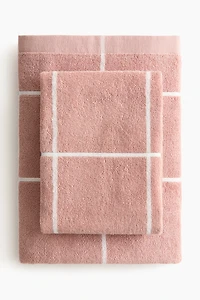 Grid-patterned bath towel