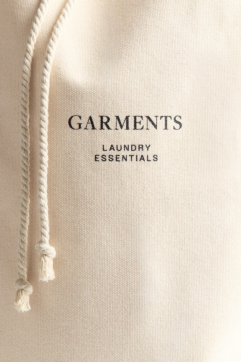 Sac à linge en coton avec texte