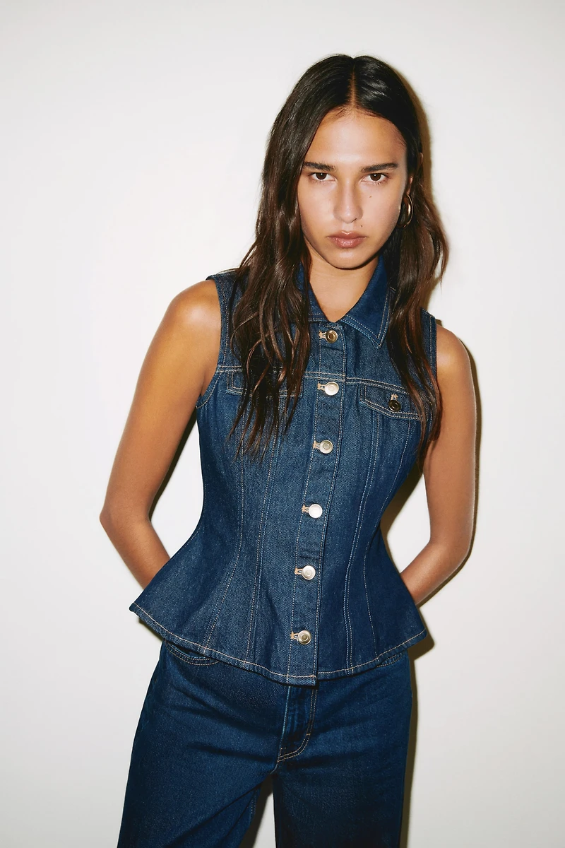 Chandail péplum sans manches en denim