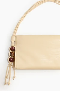 Sac à main avec perles de fantaisie