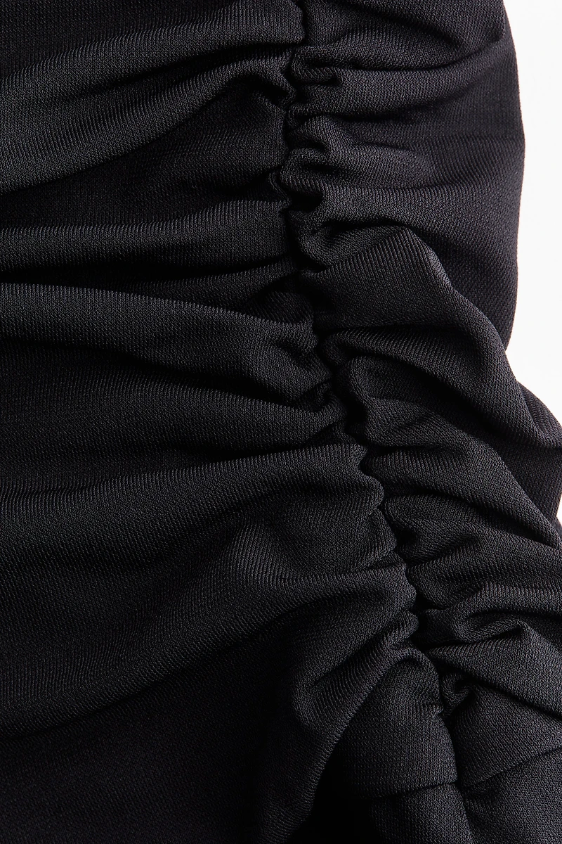 Robe dos nu à effet drapé