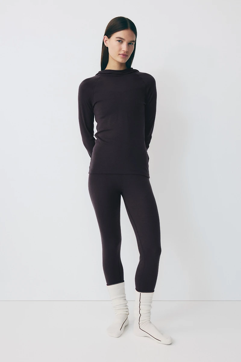 T-shirt de sport en laine avec capuchon