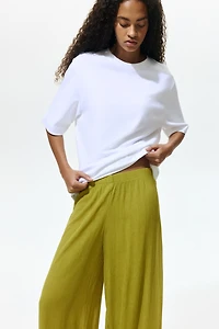 Pantalon large à effet froissé