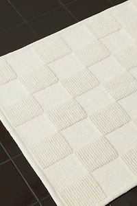 Tapis de bain à carreaux
