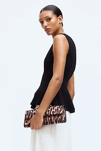 Sleeveless Peplum Top