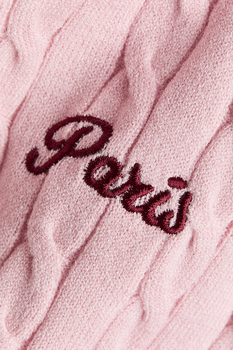 Haut en tricot torsadé