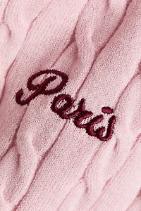 Haut en tricot torsadé