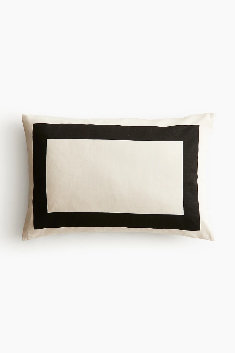 Housse de coussin en satin de coton
