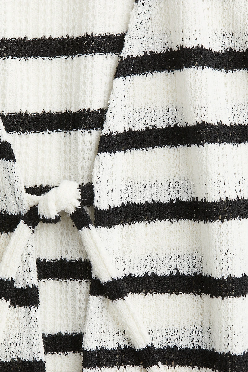 Haut en tricot avec liens à nouer