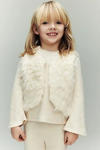 Veste sans manches duveteuse
