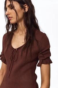 Ruffle-Trimmed Rib-Knit Top