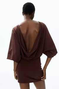 Cape-Sleeved Low-Back Dress
