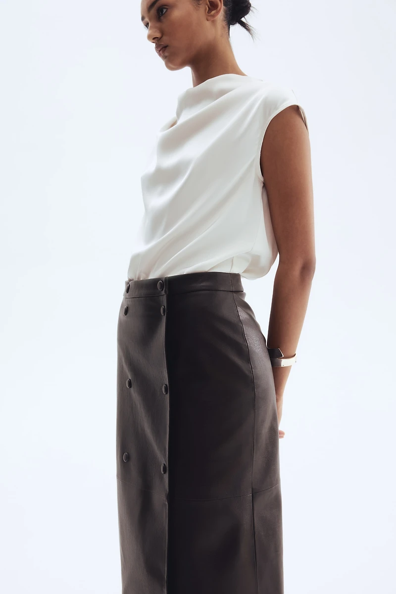 Jupe portefeuille en tissu enduit