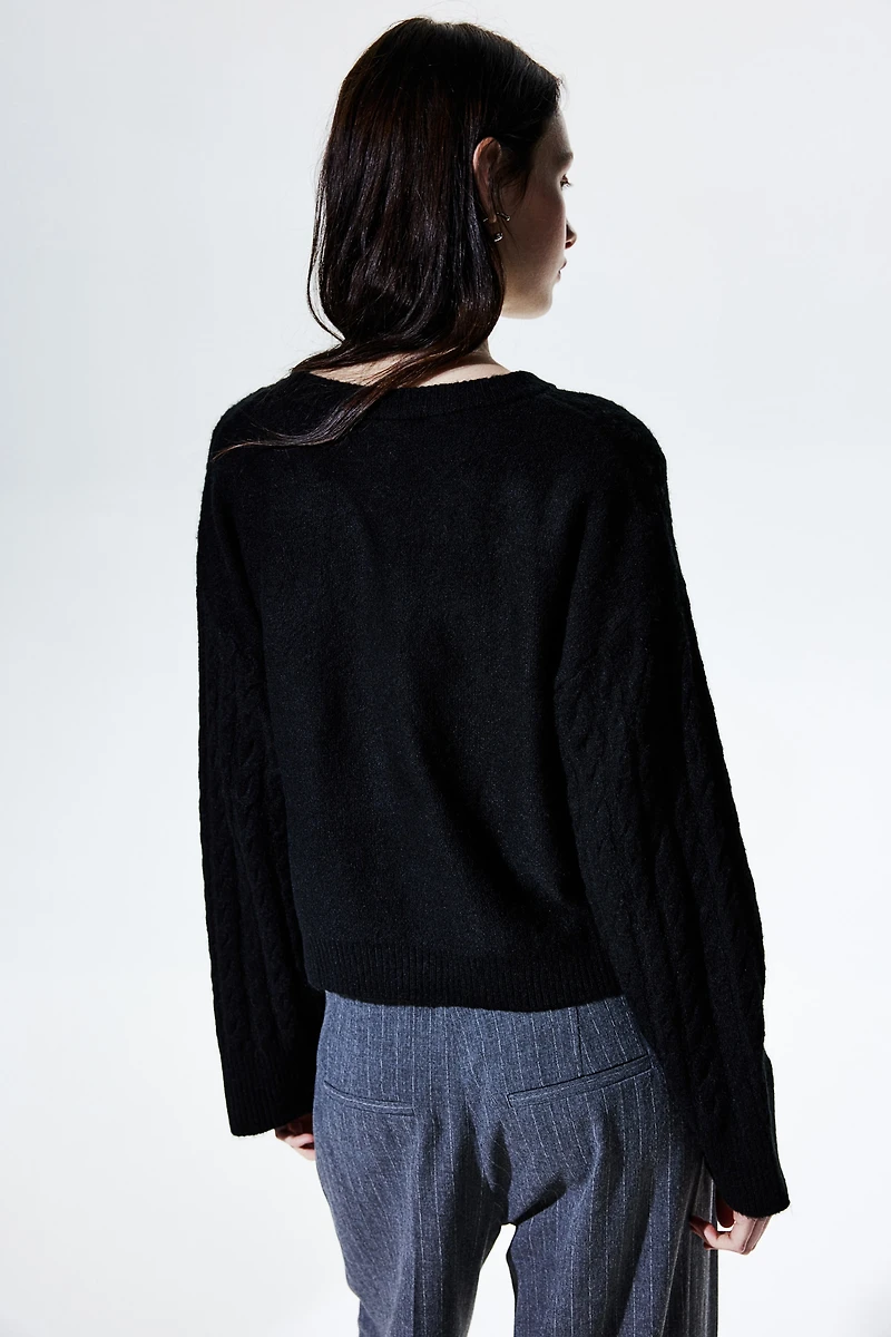 Chandail en tricot torsadé