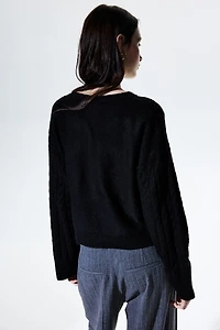 Chandail en tricot torsadé