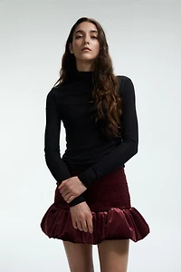 Jupe en velours smocké