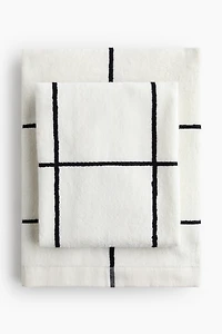 Serviette à motif quadrillé