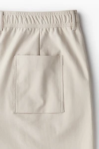 Pantalon coupe classique en sergé