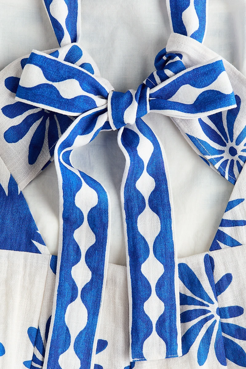 Robe sans manches à dos ouvert