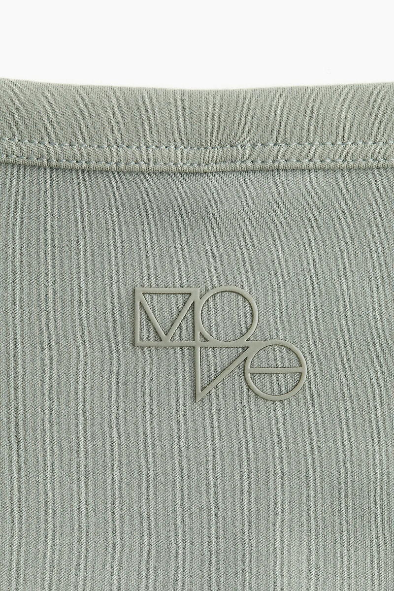 Cropped sports top with DryMove™