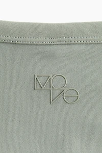 Cropped sports top with DryMove™