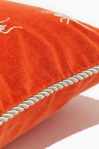 Housse de coussin brodée