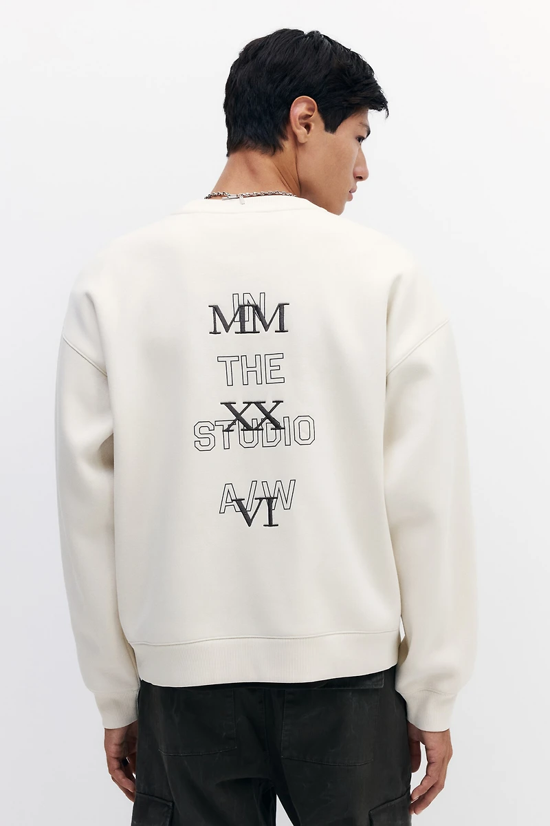 Chandail ample en molleton imprimé