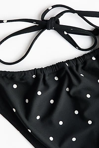 Bas de maillot Tanga échancré à nouer