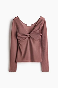 Haut scintillant avec détail torsadé