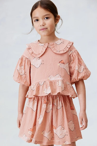 Blouse à manches bouffantes en crépon