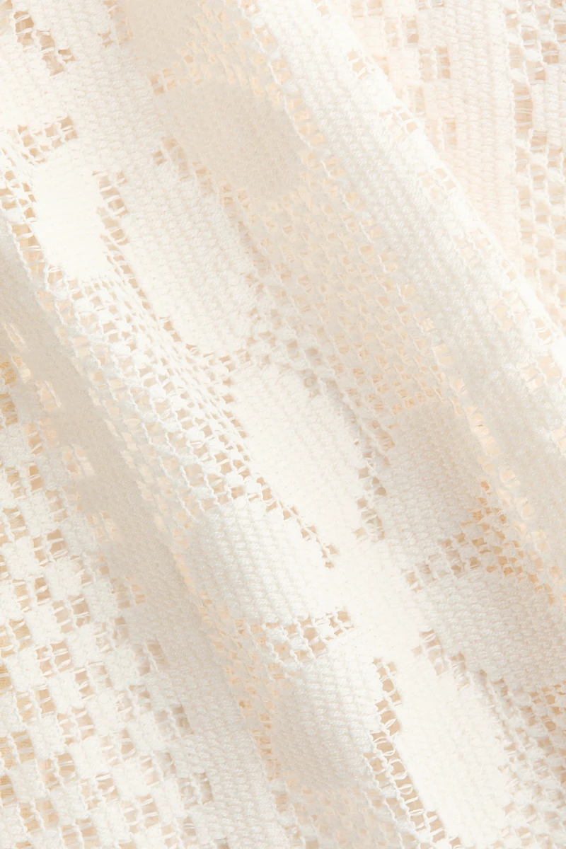 Haut d'aspect crocheté