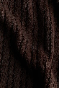 Cape en tricot côtelé