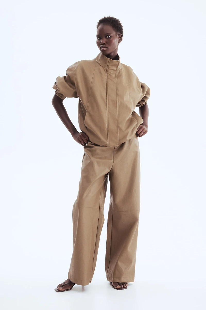 Pantalon en tissu enduit