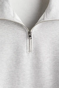 Chandail ample avec col à fermeture éclair