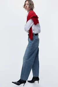 Jean tonneau en haut de la cheville