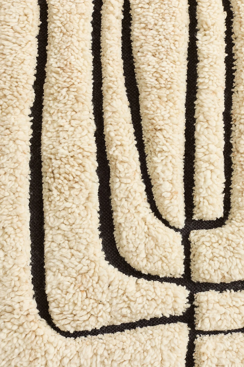 Fringed wool-blend rug