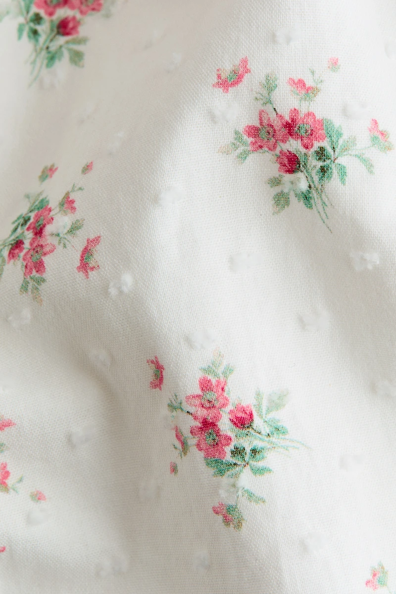 Ruffle-Trimmed Cotton Romper Suit