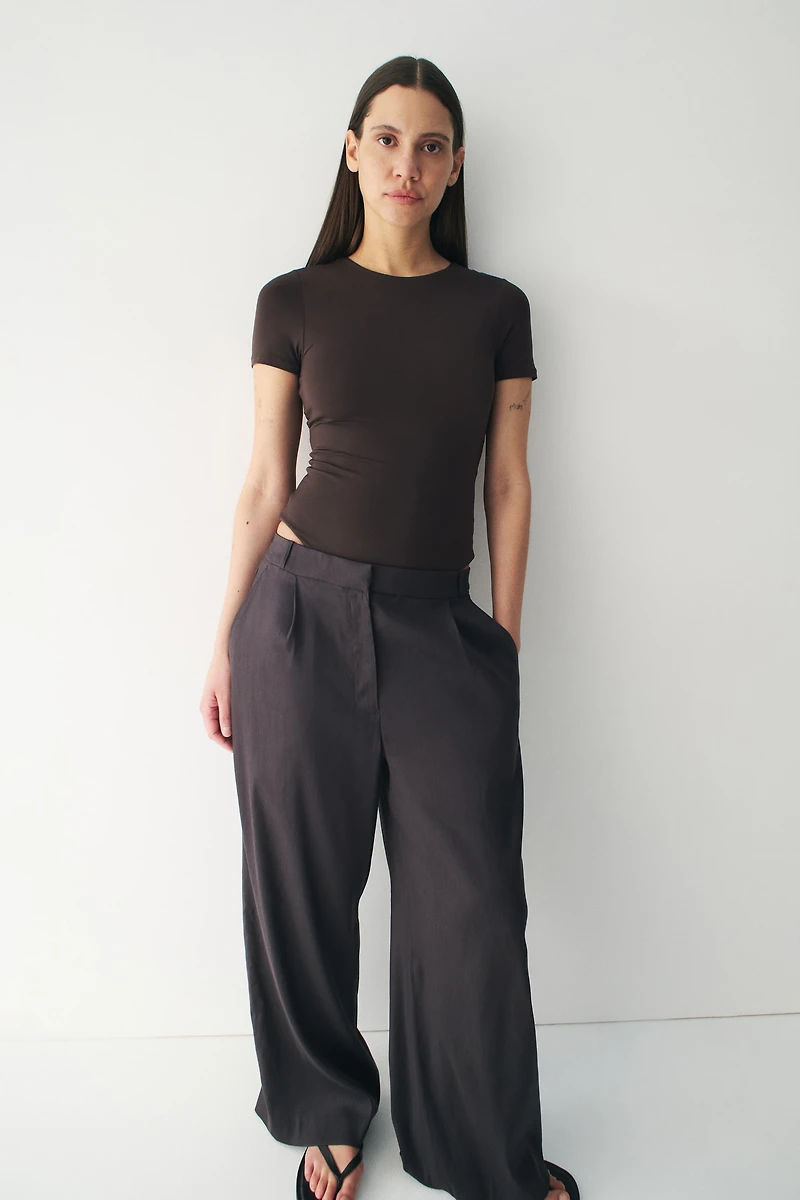 Maillot Tanga moulant à manches courtes