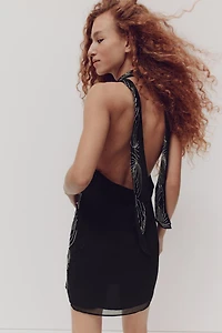 Robe ornée à dos dénudé