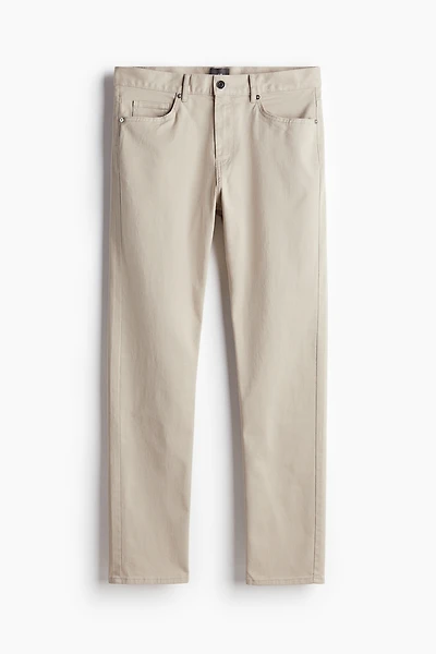Pantalon aminci en sergé de coton