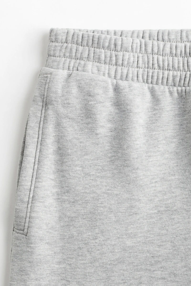 Pantalon en molleton à fermeture éclair au bas