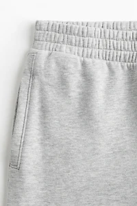 Pantalon en molleton à fermeture éclair au bas