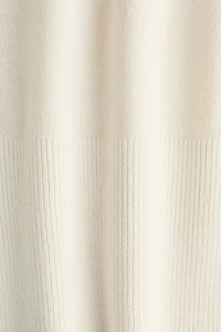 Haut asymétrique en fin tricot