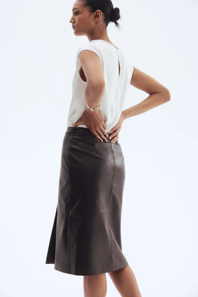 Jupe portefeuille en tissu enduit